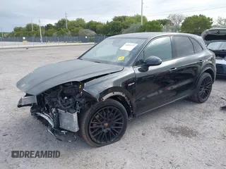 2021 Porsche Cayenne E-Hybrid Hybrid z VIN WP1AE2AYXMDA24566, wystawiony jako IAAI lot #41815737 z przebiegiem 51 149 mil mil oraz . Historia ofert i sprzedaży dostępna na DreamBid. Obrazek 18.