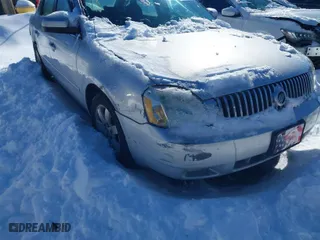 2005 Mercury Montego Luxury with VIN 1MEFM40175G603748, listed as a IAAI auction lot 41588606 with 129,930 mi miles. Bid and sale history available at carsss.com. Image 6.