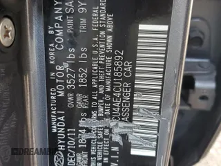 2012 Hyundai Accent GLS z VIN KMHCU4AE4CU185892, wystawiony jako Copart lot #52803675 z przebiegiem 168 792 mil mil oraz Szkoda całkowita • Salvage title. Historia ofert i sprzedaży dostępna na DreamBid. Obrazek 12.