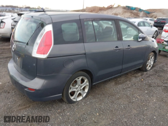 2010 Mazda 5 Sport with VIN JM1CR2WLXA0370650, listed as a IAAI auction lot 41602072 with 142,611 mi miles and . Bid and sale history available at DreamBid. Image 4.