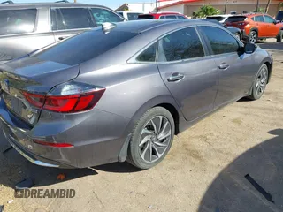 2022 Honda Insight Touring with VIN 19XZE4F93NE005200, listed as a IAAI auction lot 41994116 with 79,549 mi miles and . Bid and sale history available at carsss.com. Image 4.