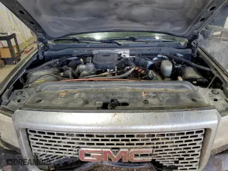2015 GMC Sierra 2500HD Denali with VIN 1GT120E84FF514856, listed as a Copart auction lot 61423374 with 204,130 mi miles and Salvage Title. Bid and sale history available at carsss.com. Image 12.