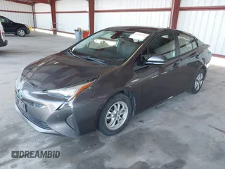 2017 Toyota Prius Two with VIN JTDKBRFU6H3578275, listed as a IAAI auction lot 42153979 with 153,901 mi miles. Bid and sale history available at carsss.com. Image 2.