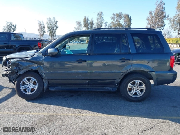 2003 Honda Pilot EX with VIN 2HKYF18633H599550, listed as a IAAI auction lot 41813549 with 242,103 mi miles. Bid and sale history available at carsss.com. Image 15.