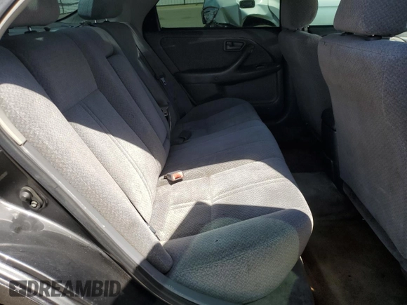 2001 Toyota Camry LE z VIN JT2BF22K010329017, wystawiony jako Copart lot #56035725 z przebiegiem 200 841 mil mil oraz Szkoda całkowita • Salvage title. Historia ofert i sprzedaży dostępna na DreamBid. Obrazek 10.