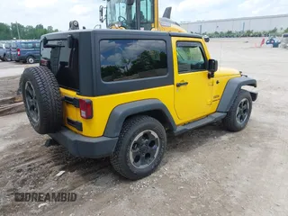 2015 Jeep Wrangler Freedom Edition with VIN 1C4AJWAG1FL652522, listed as a IAAI auction lot 42592232 with Not provided miles and . Bid and sale history available at DreamBid. Image 4.