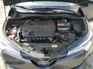 2018 Toyota C-HR XLE z VIN JTNKHMBX2J1003394, wystawiony jako Copart lot #58234865 z przebiegiem 132 574 mil mil oraz Szkoda całkowita • Salvage title. Historia ofert i sprzedaży dostępna na DreamBid. Obrazek 11.