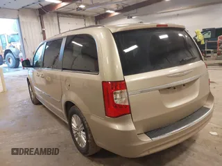 2013 Chrysler Town & Country Touring L with VIN 2C4RC1CG3DR606952, listed as a IAAI auction lot 42189429 with 145,654 mi miles and . Bid and sale history available at DreamBid. Image 3.