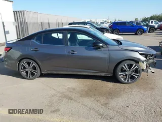 2021 Nissan Sentra SR z VIN 3N1AB8DV0MY290032, wystawiony jako IAAI lot #41819281 z przebiegiem 265 088 mil mil oraz . Historia ofert i sprzedaży dostępna na DreamBid. Obrazek 14.