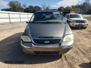 2002 Ford Windstar SE with VIN 2FMZA52462BA09199, listed as a Copart auction lot 83097064 with 216,158 mi miles and Salvage title. Bid and sale history available at DreamBid. Image 5.