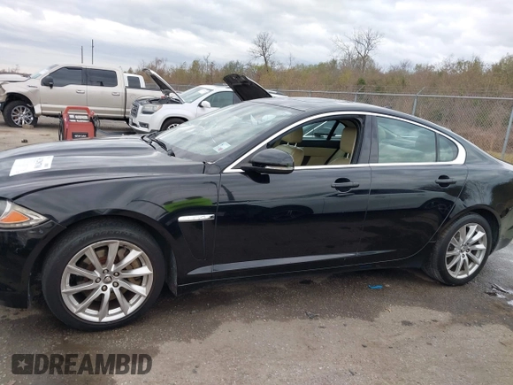 2013 Jaguar XF I4 RWD with VIN SAJWA0ES3DPS74714, listed as a IAAI auction lot 41298780 with 130,359 mi miles. Bid and sale history available at carsss.com. Image 14.