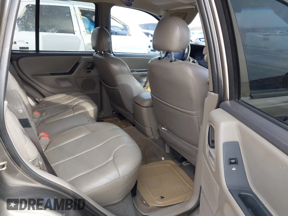 1999 Jeep Grand Cherokee Laredo с VIN 1J4G258S8XC650533, выставлен на аукционе IAAI как лот 41583331 с пробегом 245 164 миль миль и . История ставок и продаж доступна на DreamBid. Изображение 8.