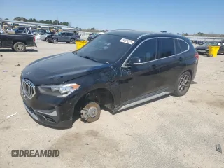 2021 BMW X1 xDrive28i z VIN WBXJG9C07M5S73464, wystawiony jako Copart lot #50374525 z przebiegiem 117 828 mil mil oraz Tytuł czysty. Historia ofert i sprzedaży dostępna na DreamBid. Obrazek 1.