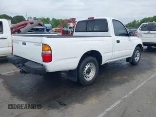 2003 Toyota Tacoma with VIN 5TENL42N33Z185971, listed as a IAAI auction lot 41994790 with 269,158 mi miles and . Bid and sale history available at DreamBid. Image 4.