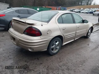 2002 Pontiac Grand Am SE1 with VIN 1G2NF52F82C269968, listed as a IAAI auction lot 41541497 with 212,736 mi miles. Bid and sale history available at carsss.com. Image 4.