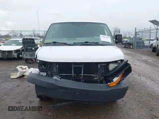 2014 Chevrolet Express Cargo Van with VIN 1GCWGGCA0E1155572, listed as a IAAI auction lot 41965353 with 324,538 mi miles. Bid and sale history available at carsss.com. Image 12.