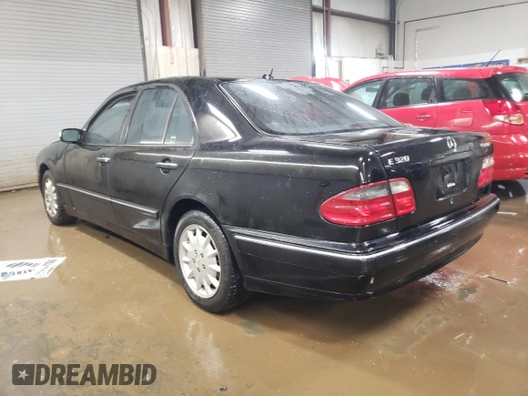 2001 Mercedes-Benz E-Class AWD with VIN WDBJF82J11X056639, listed as a Copart auction lot 49428325 with 145,218 mi miles and Salvage Title. Bid and sale history available at carsss.com. Image 2.