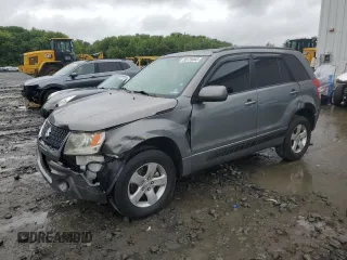 2009 Suzuki Grand Vitara z VIN JS3TD044794100716, wystawiony jako Copart lot #58739065 z przebiegiem 151 638 mil mil oraz Szkoda całkowita • Salvage title. Historia ofert i sprzedaży dostępna na DreamBid. Obrazek 1.