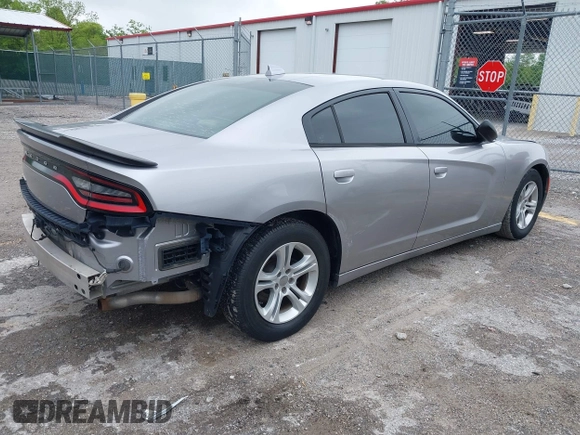 2015 Dodge Charger SXT with VIN 2C3CDXHG1FH886088, listed as a IAAI auction lot 42331369 with 119,659 mi miles and . Bid and sale history available at DreamBid. Image 4.