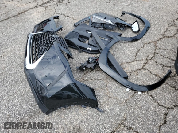 2023 Lexus UX 250h Premium с VIN JTHP6JBH8P2133821, выставлен на аукционе Copart как лот 61007355 с пробегом 32 540 миль миль и Списание • Salvage title. История ставок и продаж доступна на DreamBid. Изображение 13.