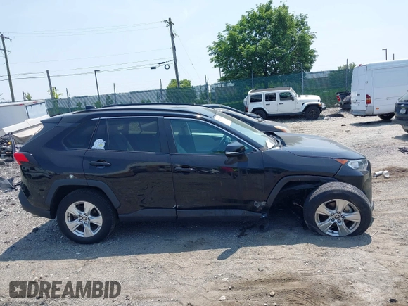 2021 Toyota RAV4 XLE with VIN 2T3P1RFV4MC255062, listed as a IAAI auction lot 42371268 with 34,285 mi miles and . Bid and sale history available at DreamBid. Image 14.