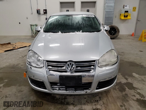 2006 Volkswagen Jetta z VIN 3VWRF31K86M618158, wystawiony jako Copart lot #42728175 z przebiegiem 117 433 mil mil oraz Czysty tytuł • Clean title. Historia ofert i sprzedaży dostępna na DreamBid. Obrazek 5.