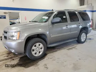 2007 Chevrolet Tahoe LS z VIN 1GNFC13C37J332412, wystawiony jako Copart lot #85560174 z przebiegiem 247 590 mil mil oraz Czysty tytuł • Clean title. Historia ofert i sprzedaży dostępna na DreamBid. Obrazek 1.