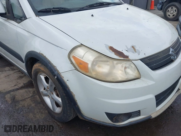 2007 Suzuki SX4 with VIN JS2YB413975105927, listed as a IAAI auction lot 42136696 with 232,480 mi miles. Bid and sale history available at carsss.com. Image 12.