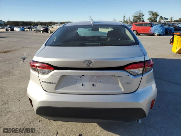 2023 Toyota Corolla LE with VIN 5YFB4MDE9PP026235, listed as a Copart auction lot 82431974 with 15,877 mi miles and Salvage Title. Bid and sale history available at carsss.com. Image 6.