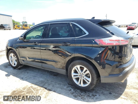 2019 Ford Edge SEL z VIN 2FMPK3J9XKBC19570, wystawiony jako Copart lot #55272125 z przebiegiem 69 602 mil mil oraz Szkoda całkowita • Salvage title. Historia ofert i sprzedaży dostępna na DreamBid. Obrazek 2.