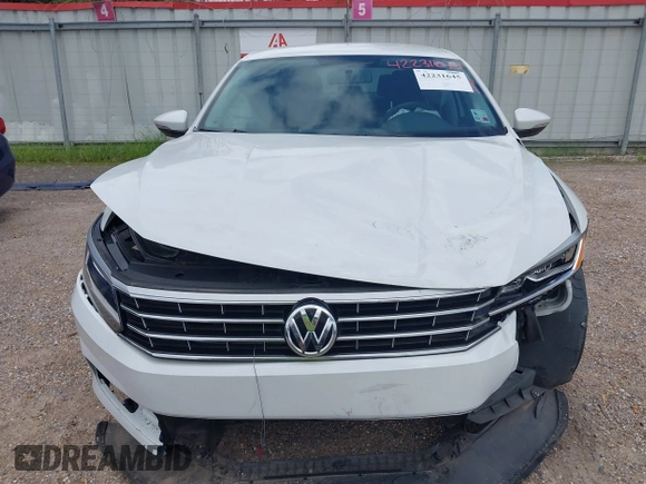 2016 Volkswagen Passat S with VIN 1VWAT7A32GC031172, listed as a IAAI auction lot 42231645 with 112,974 mi miles and . Bid and sale history available at DreamBid. Image 13.