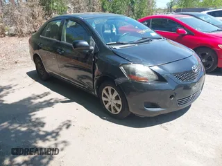 2012 Toyota Yaris z VIN JTDBT4K31CL017875, wystawiony jako IAAI lot #42384123 z przebiegiem 138 513 mil mil oraz . Historia ofert i sprzedaży dostępna na DreamBid. Obrazek 1.
