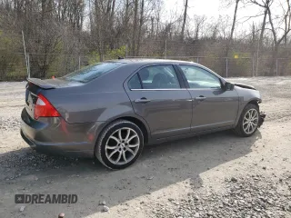 2012 Ford Fusion SE with VIN 3FAHP0HA4CR275893, listed as a Copart auction lot 52882725 with 192,725 mi miles and Salvage Title. Bid and sale history available at DreamBid. Image 3.