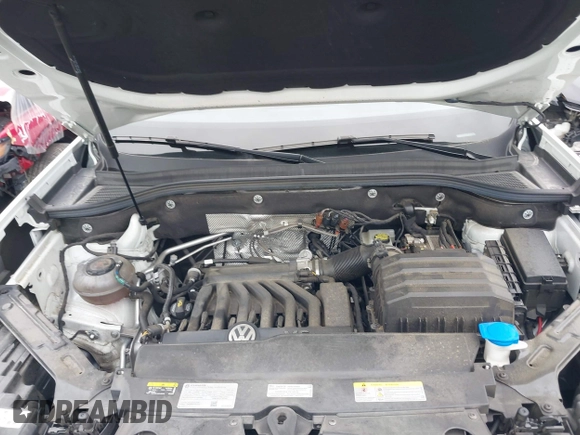 2023 Volkswagen Atlas SE z VIN 1V2KE2CA7PC208457, wystawiony jako IAAI lot #41479156 z przebiegiem 45 704 mil mil oraz . Historia ofert i sprzedaży dostępna na DreamBid. Obrazek 10.
