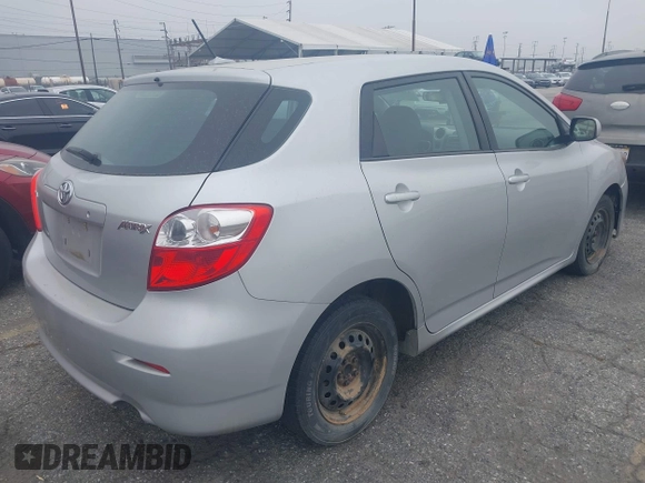 2009 Toyota Matrix with VIN 2T1KU40E49C130897, listed as a IAAI auction lot 42164096 with 140,273 mi miles. Bid and sale history available at carsss.com. Image 4.