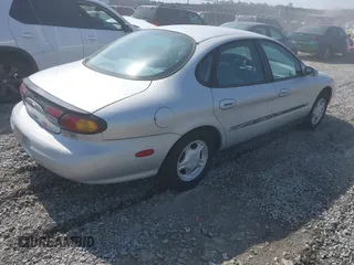 1997 Ford Taurus GL z VIN 1FALP52U9VA295404, wystawiony jako IAAI lot #42234839 z przebiegiem 163 080 mil mil oraz . Historia ofert i sprzedaży dostępna na DreamBid. Obrazek 4.
