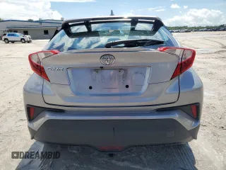 2018 Toyota C-HR XLE with VIN NMTKHMBX7JR021704, listed as a Copart auction lot 71171874 with 82,872 mi miles and Salvage Title. Bid and sale history available at DreamBid. Image 6.