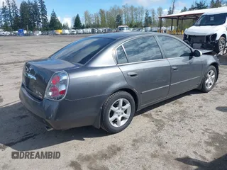 2005 Nissan Altima SE with VIN 1N4BL11E85C290306, listed as a IAAI auction lot 41942794 with 108,727 mi miles. Bid and sale history available at carsss.com. Image 4.