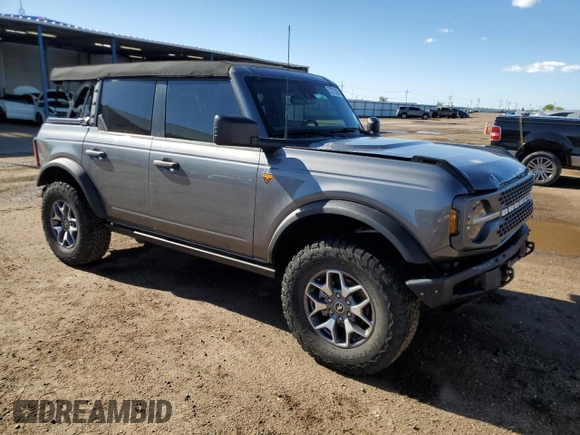 2023 Ford Bronco with VIN 1FMEE5DP0PLC10002, listed as a Copart auction lot 57272555 with 14,035 mi miles and Salvage title. Bid and sale history available at DreamBid. Image 4.
