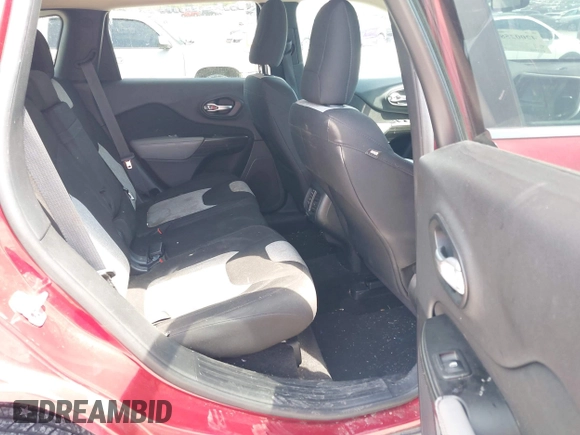 2014 Jeep Cherokee Altitude with VIN 1C4PJMCB7EW185958, listed as a IAAI auction lot 42002583 with 118,256 mi miles and . Bid and sale history available at DreamBid. Image 8.