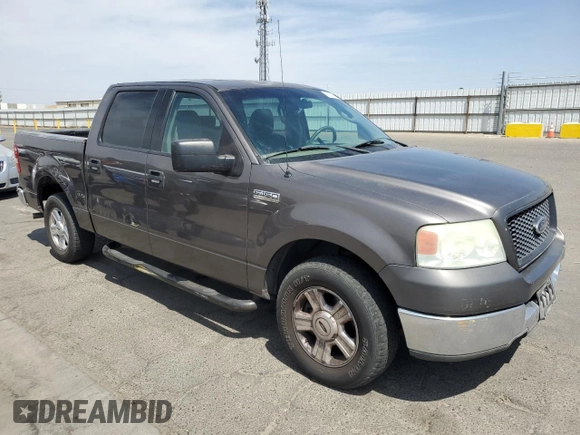 2004 Ford F-150 XLT with VIN 1FTRW12W74KC26169, listed as a Copart auction lot 68393914 with 118,059 mi miles and Salvage Title. Bid and sale history available at DreamBid. Image 4.