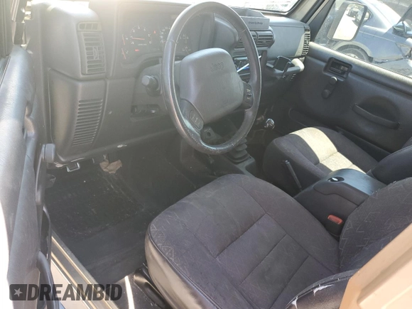 2002 Jeep Wrangler Sport with VIN 1J4FA49S72P765939, listed as a Copart auction lot 50615035 with 210,516 mi miles and Salvage Title. Bid and sale history available at carsss.com. Image 8.