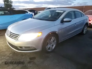 2014 Volkswagen CC Sport with VIN WVWBP7AN9EE500997, listed as a Copart auction lot 41471665 with 87,876 mi miles and Salvage Title. Bid and sale history available at carsss.com. Image 1.
