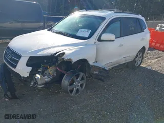 2009 Hyundai Santa Fe SE with VIN 5NMSH13E39H290889, listed as a IAAI auction lot 41312186 with 149,874 mi miles. Bid and sale history available at carsss.com. Image 2.