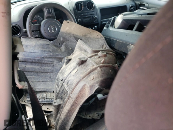 2011 Jeep Patriot Sport with VIN 1J4NT1GA4BD208339, listed as a Copart auction lot 60903265 with 210,513 mi miles and Salvage title. Bid and sale history available at DreamBid. Image 8.