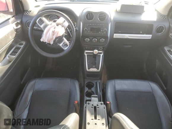 2016 Jeep Compass Latitude with VIN 1C4NJDEB8GD691124, listed as a Copart auction lot 48201175 with 136,842 mi miles and Salvage Title. Bid and sale history available at carsss.com. Image 8.