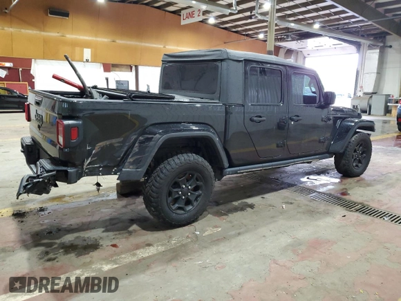 2021 Jeep Gladiator Willys with VIN 1C6HJTAG4ML556255, listed as a Copart auction lot 57143125 with 57,104 mi miles and Salvage title. Bid and sale history available at DreamBid. Image 3.