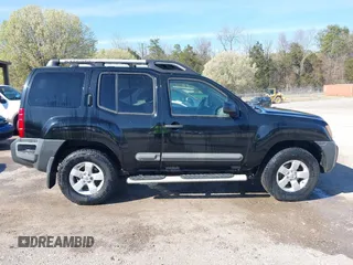 2012 Nissan Xterra S with VIN 5N1AN0NW2CC521142, listed as a IAAI auction lot 41858699 with 214,789 mi miles and . Bid and sale history available at DreamBid. Image 13.