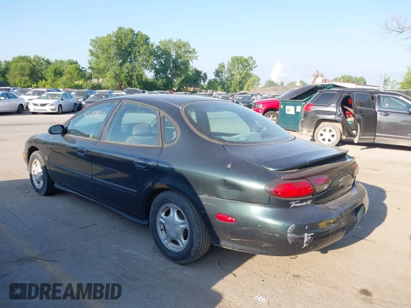 1999 Ford Taurus SE Comfort z VIN 1FAFP53S3XG104165, wystawiony jako IAAI lot #42234147 z przebiegiem 183 124 mil mil oraz . Historia ofert i sprzedaży dostępna na DreamBid. Obrazek 3.