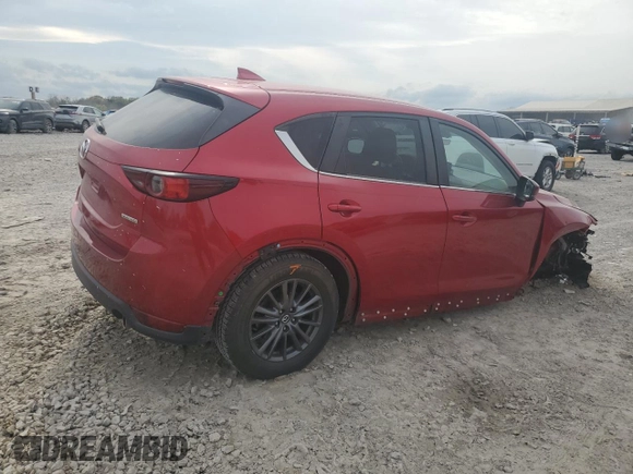 2021 Mazda CX-5 Touring with VIN JM3KFACM7M0334633, listed as a Copart auction lot 51618875 with 70,558 mi miles and Salvage Title. Bid and sale history available at DreamBid. Image 3.